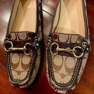 Brown Coach emblem loafers